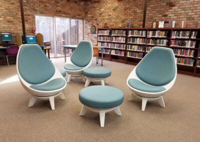 Teen Room with large blue and white chairs.